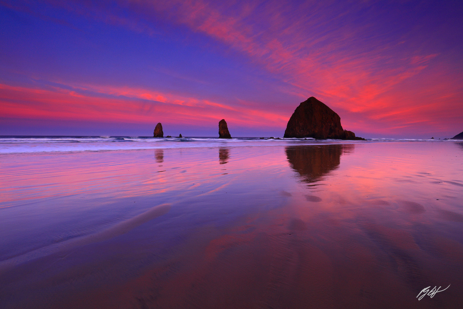 Sunrise with Haystack Rock and the Needles from Cannon Beach in Oregon