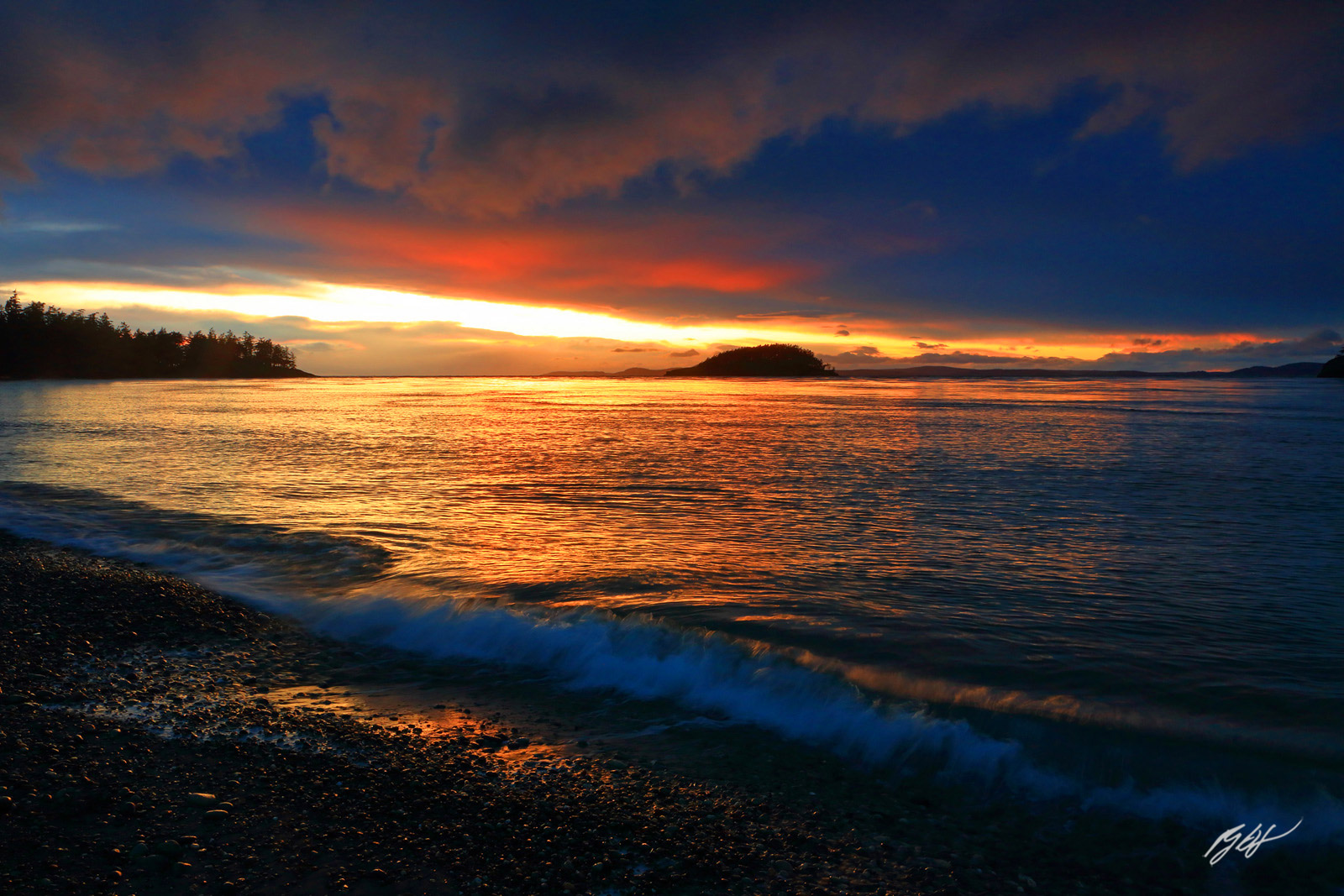 Sunset and Waves on North Beach in Deception Pass State Park on Whidbey Island in Washington