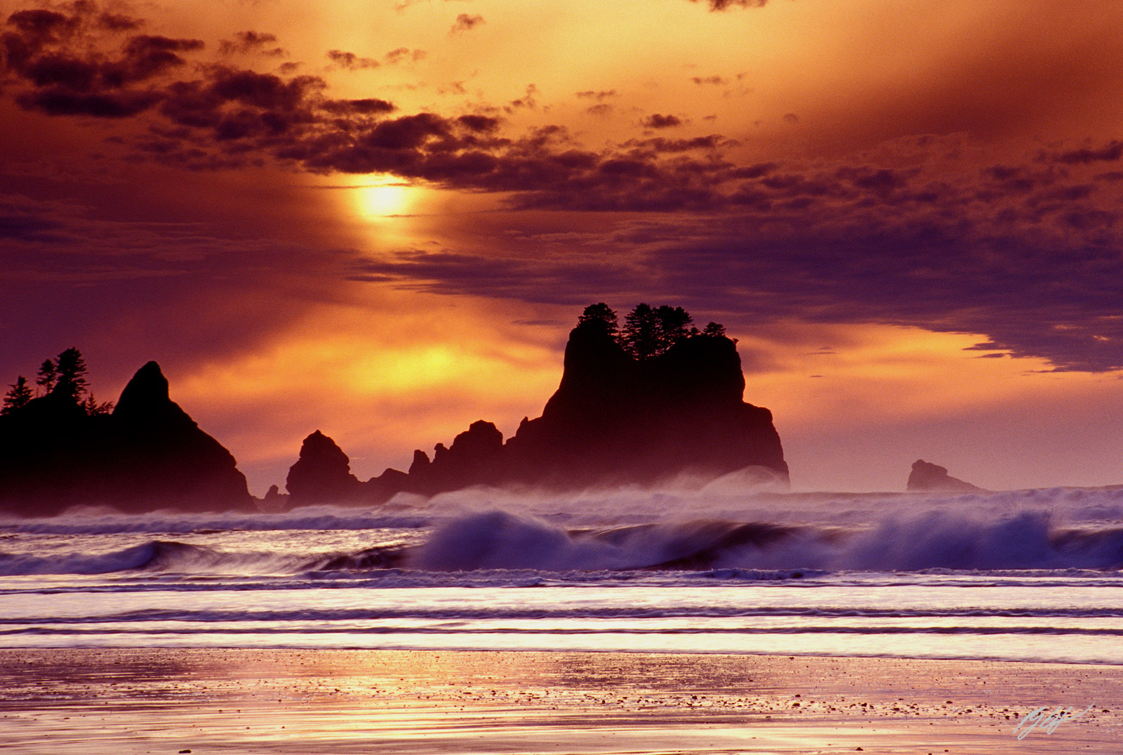 Sunset and Surf with the Point of the Arches from Shi Shi Beach in Olympic National Park in Washington