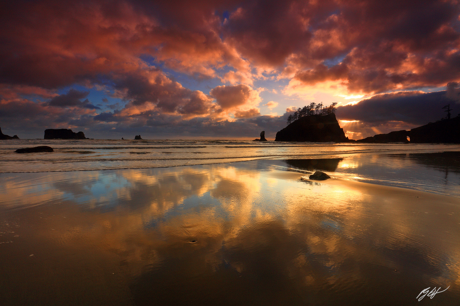 Sunset and Cloud Reflections on Second Beach in Olympic National Park in Washington
