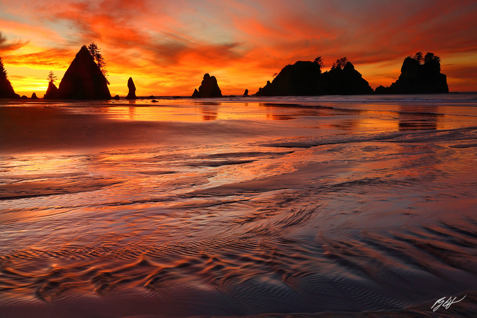 Sunset and Point of the Arches from Shi Shi Beach in Olympic National Park, in Washington