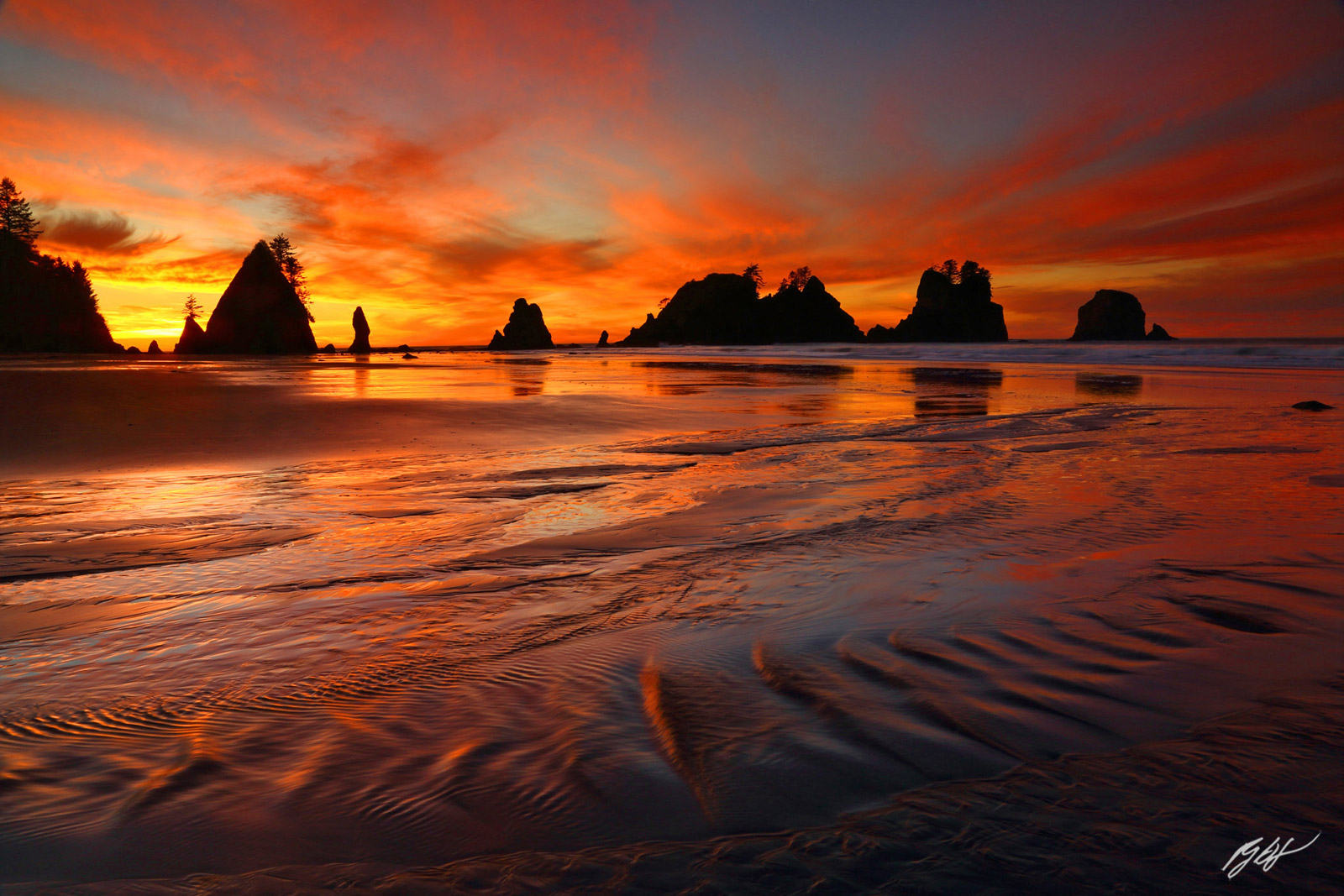 Sunset and Point of the Arches from Shi Shi Beach in Olympic National Park, in Washington