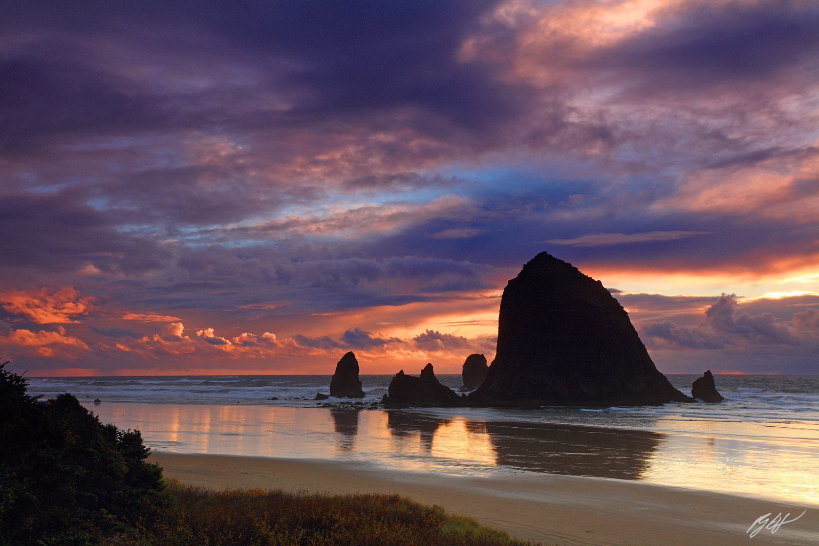 Sunset Haystack Rock and the Needles for Cannon beach on the Oregon Coast