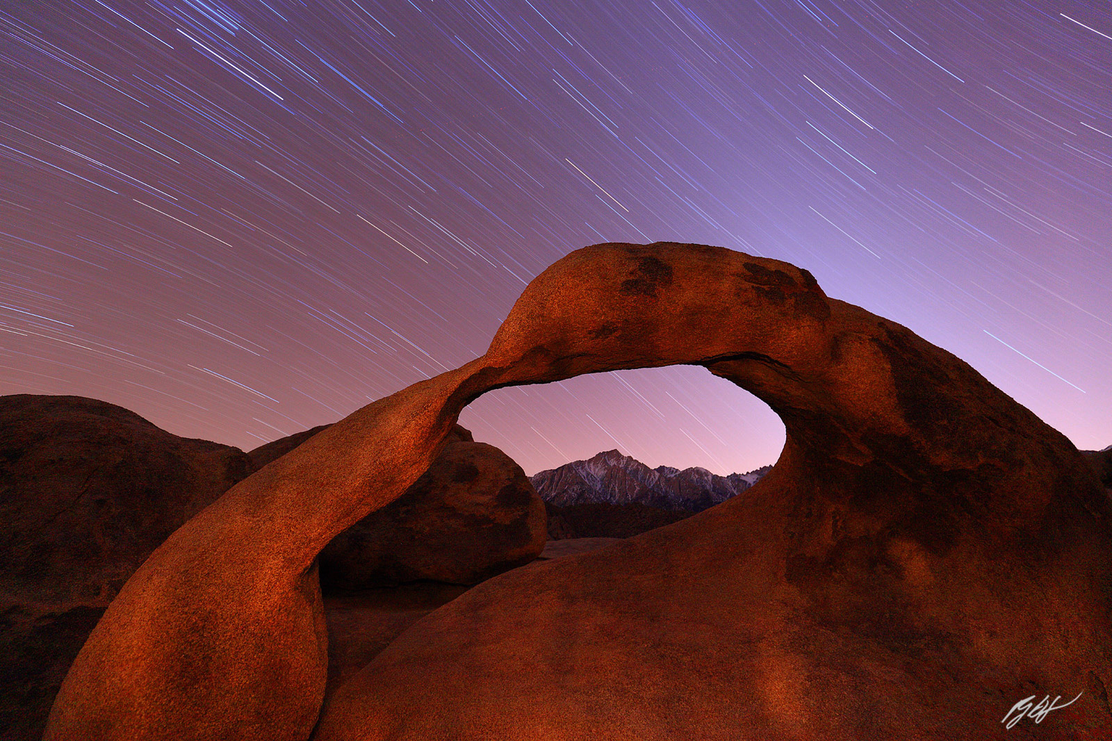 Star Trails and the Mobious Arch with Lone Pine Peak in the Alabama Hills in California