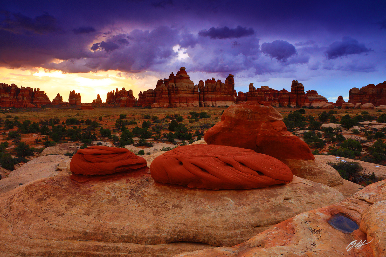 Sun Sneak under a Thunderstorm at Sunset in Chesler Park in Canyonlands National Park in Utah