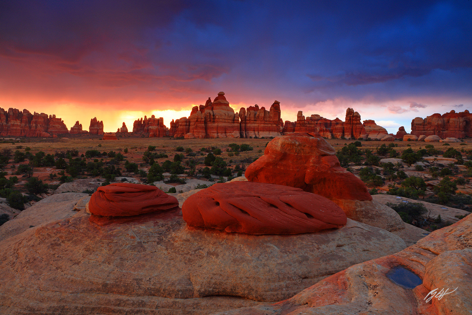 Sunset after a Thunderstorm with the Needles in Chesler Park in Canyonlands National Park in Utah