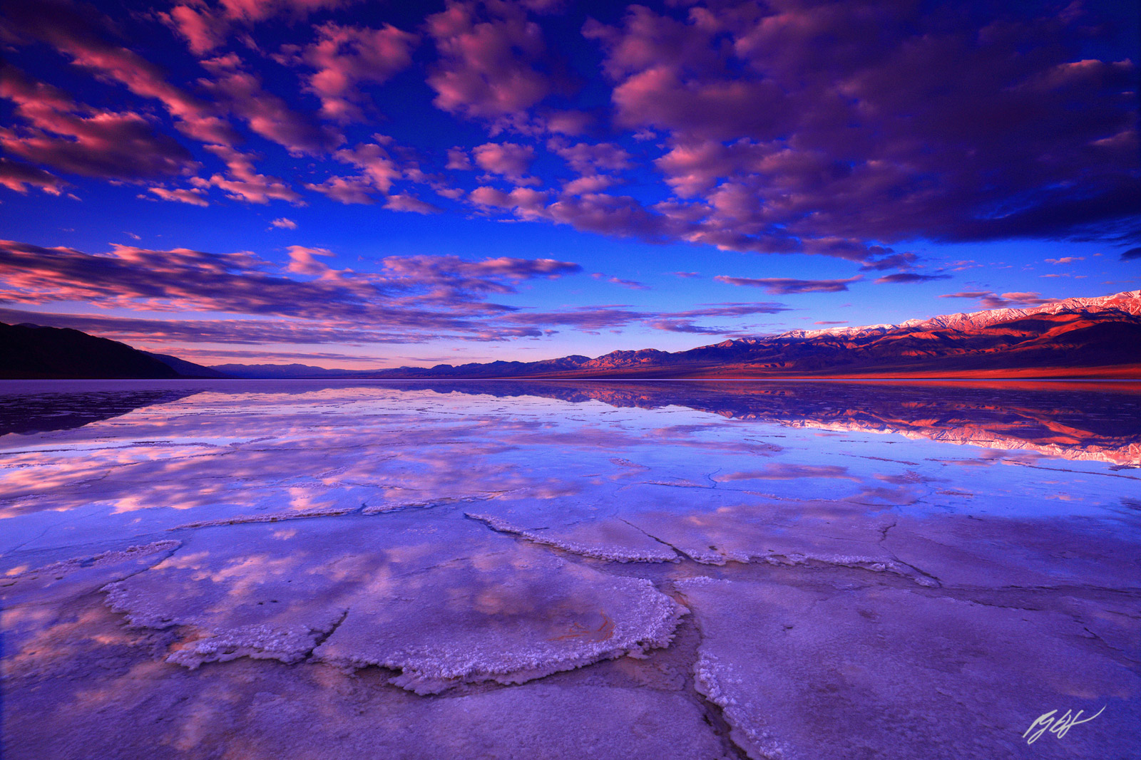 Sunrise Reflection on the Bad Water Salt Flats in Death Valley National Park in California