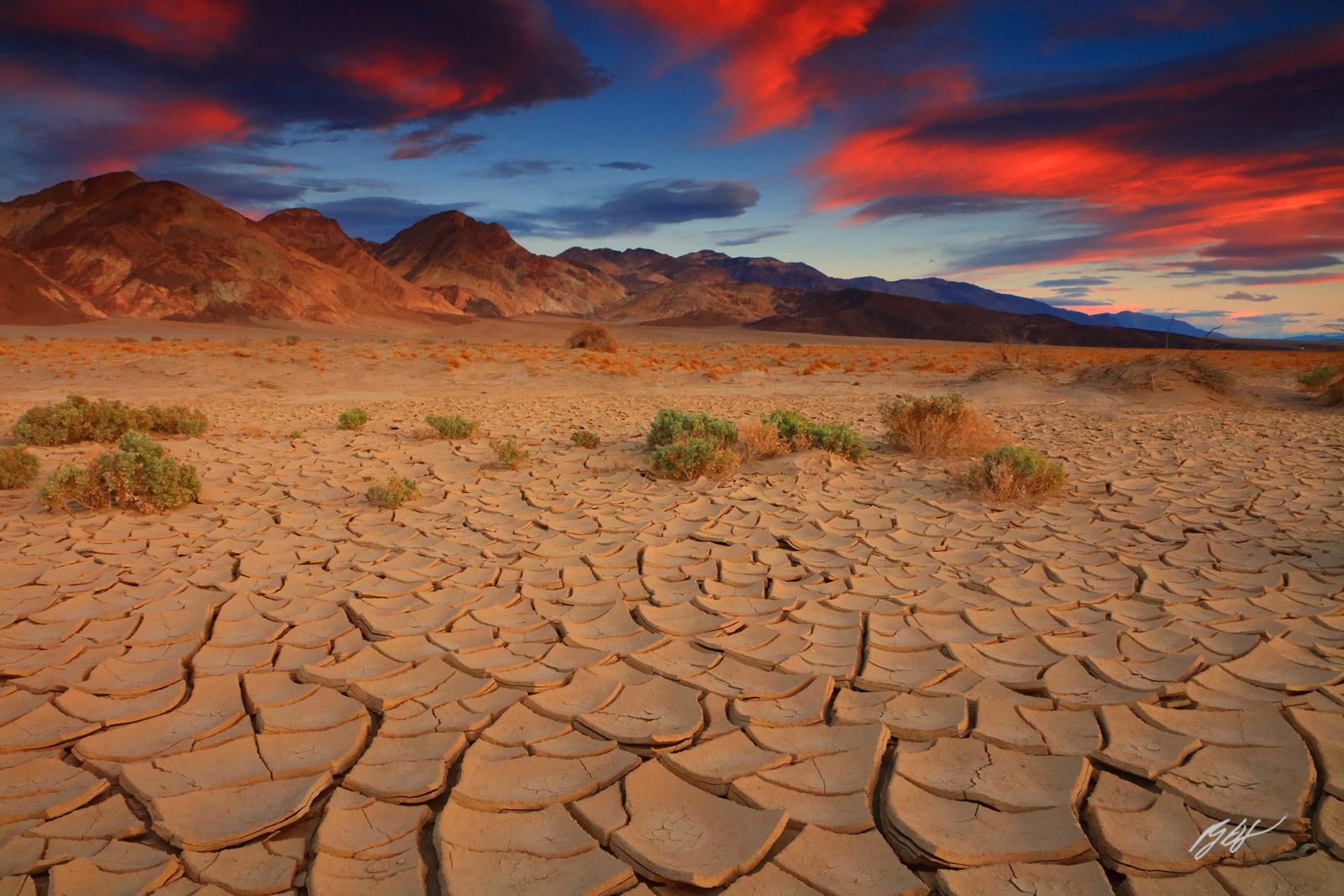 Sunset over the Cracked Earth Mud Tiles in Death Valley National Park in California