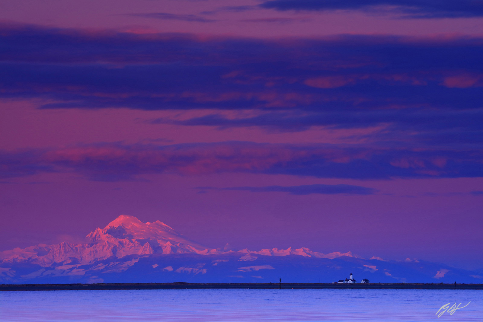 New Dungeness Lighthouse and Mt Baker from the New Dungeness Spit in Sequim Washington