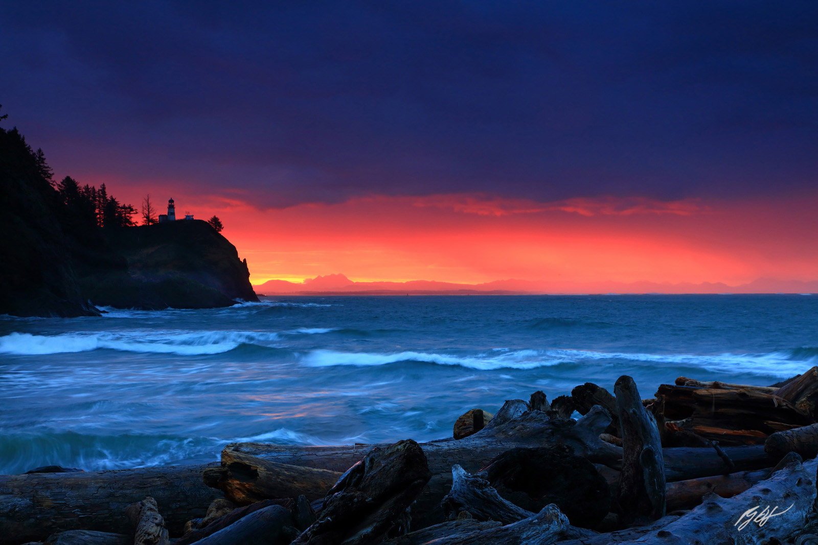 Sunrise with the Cape Disappointment Lighthouse in Cape Disappointment State Park in Washington