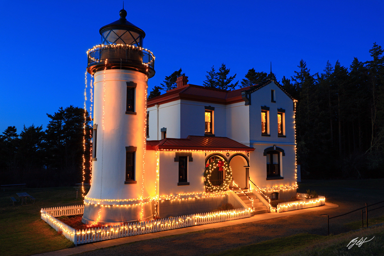 Admiralty Head Lighthouse at Night with Holiday Light in Fort Casey State Park in Washington
