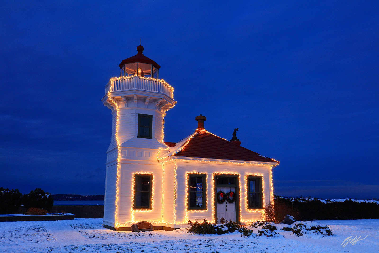 Mukilteo Lighthouse at Night with Holiday Lights in Mukilteo Lighthouse Park in Washington