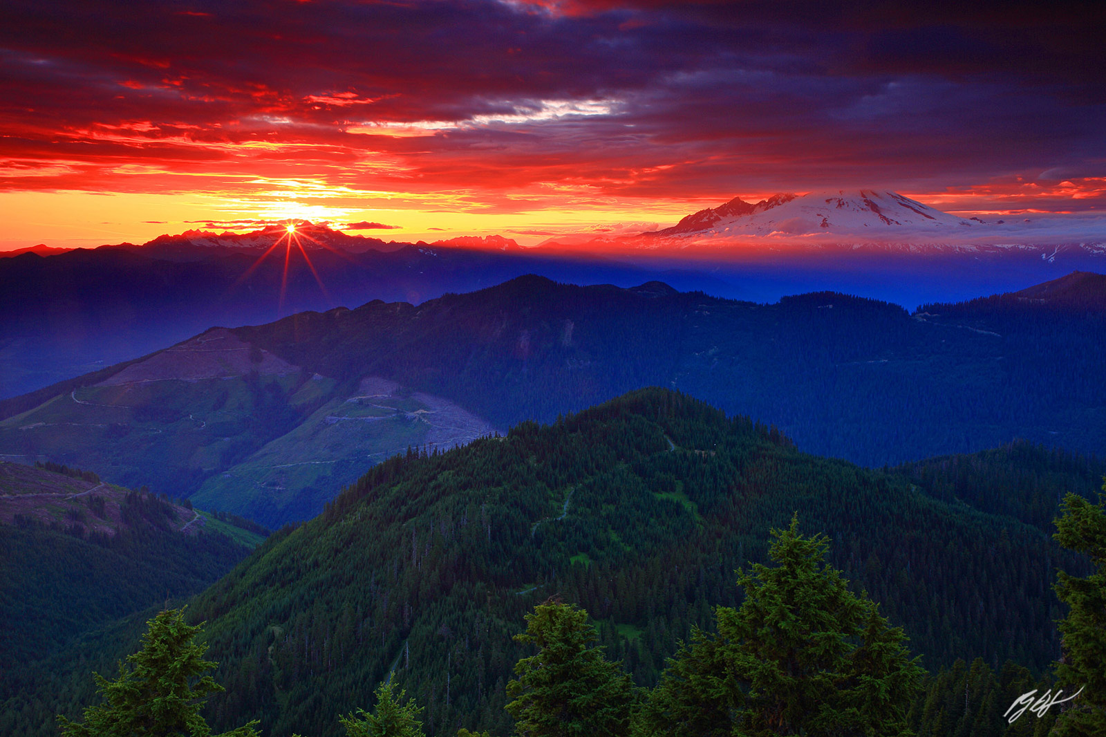 Sunset and Sun Star with Mt Baker from Sauk Mountain Summit, Washington