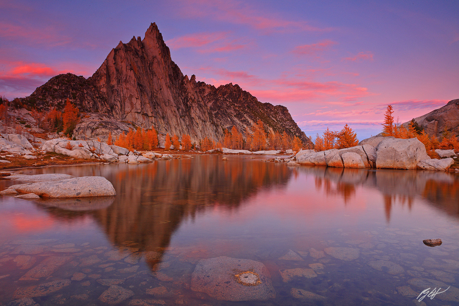 Sunset alpenglow Reflected in Gnome Tarn in the Enchantments, Alpine Lakes Wilderness in Washington
