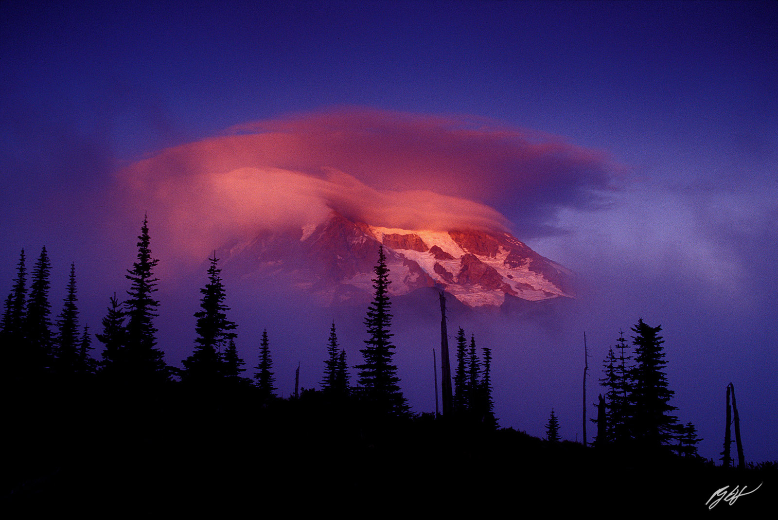 Sunset Lenticular Cloud and Mt Rainier from the Wonderland Trail in Mt Rainier National Park in Washington