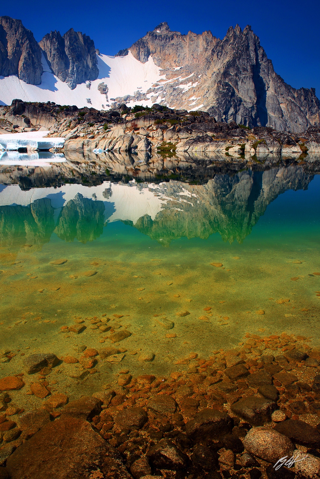 Dragontail Peak Reflected in Tranquil Lake in the Upper Enchantments in the Alpine Lakes Wilderness in Washington