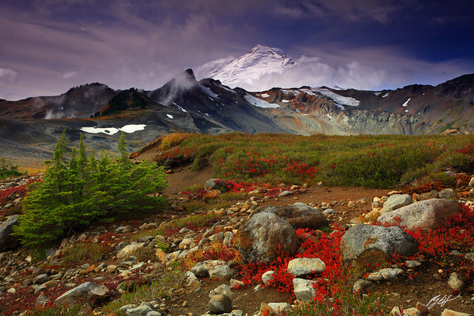 Morning Light as Mt. Baker Peaks out of the Clouds from Ptarmigan Ridge in the Mt Baker Wilderness in Washington