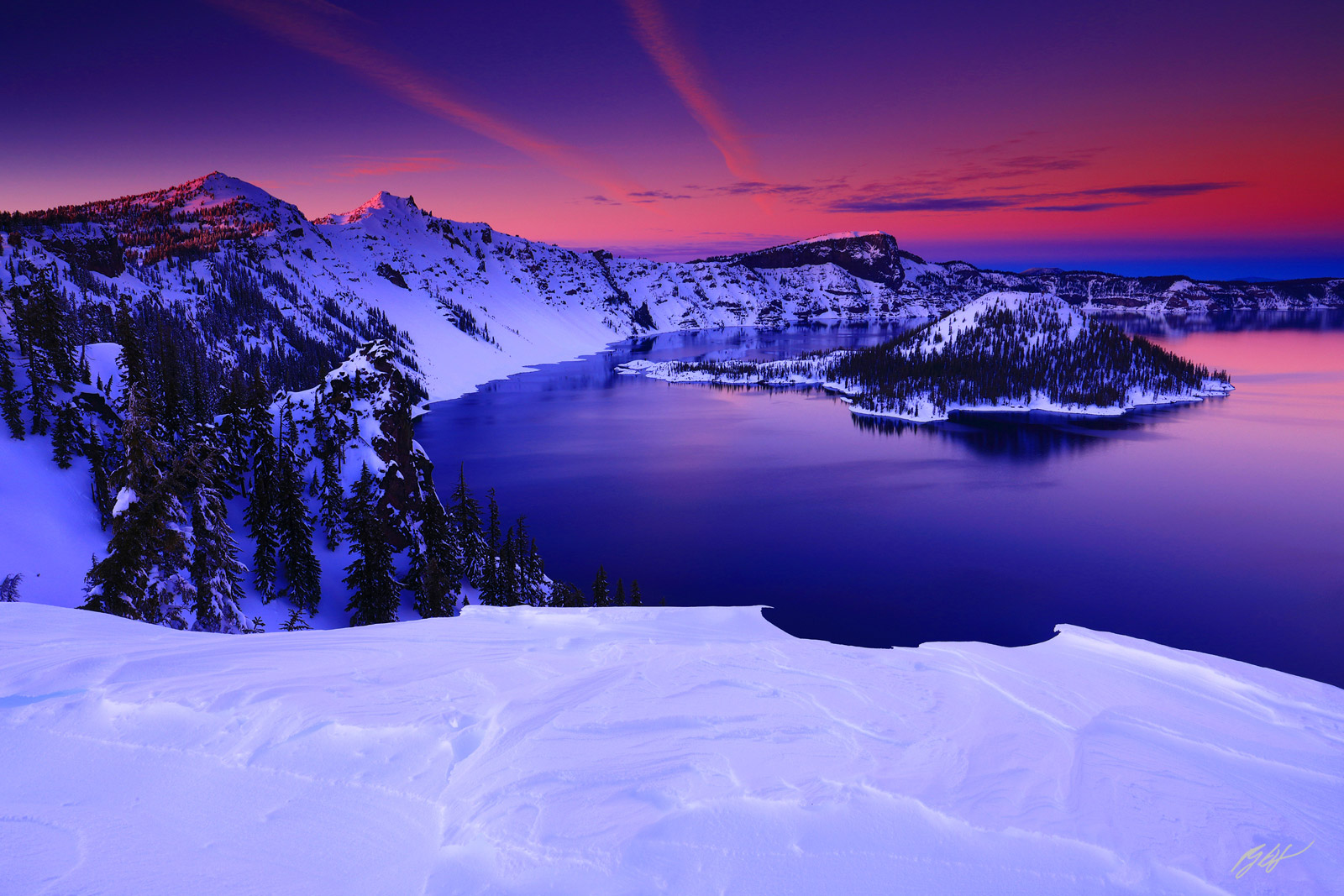 Winter Sunset over Crater Lake and Wizard Island in Crater Lake National Park in Oregon