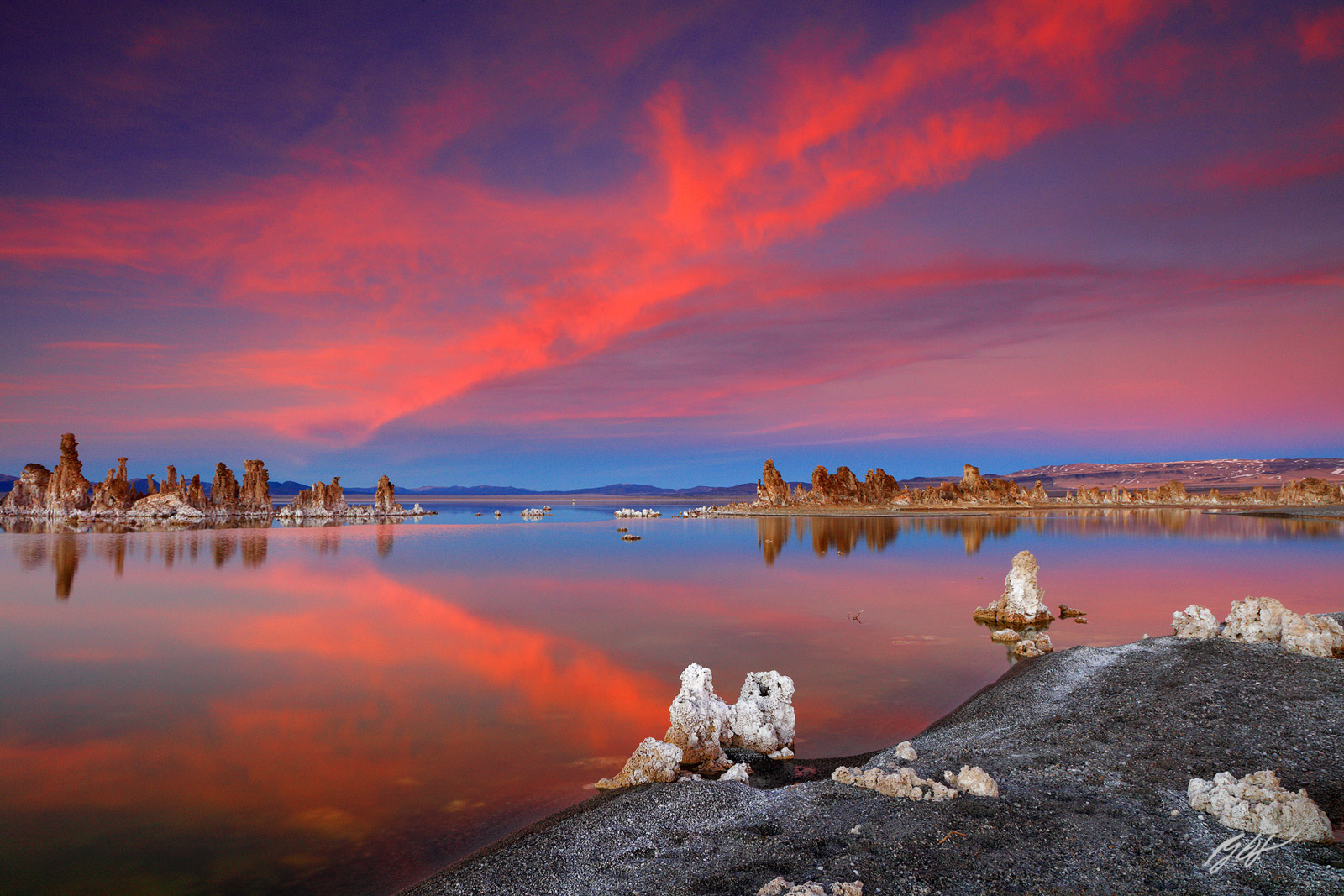 Sunset and Tufa Formations Reflected in Mono Lake in Mono County California