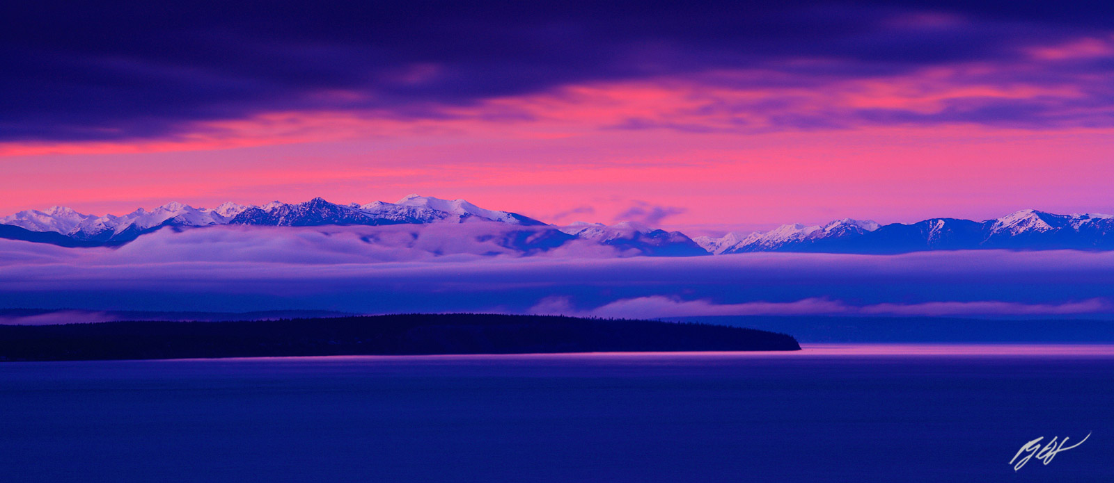 Sunrise with the Olympic Mountains in the Clouds from Whidbey Island, Washington