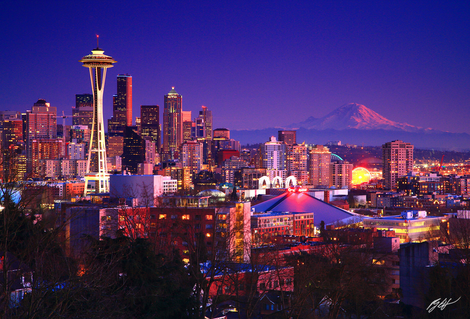 Seattle Skyline at Night with Mt Rainier from Kerry Park on Queen Ann Hill in Seattle, Washington