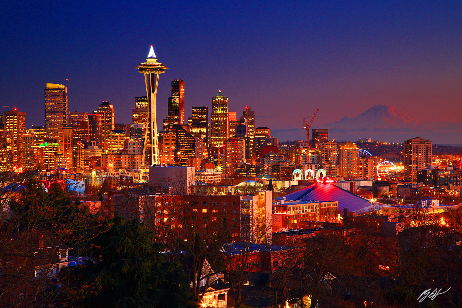 Seattle Skyline at Night with Mt Rainier from Kerry Park on Queen Ann Hill in Seattle Washington
