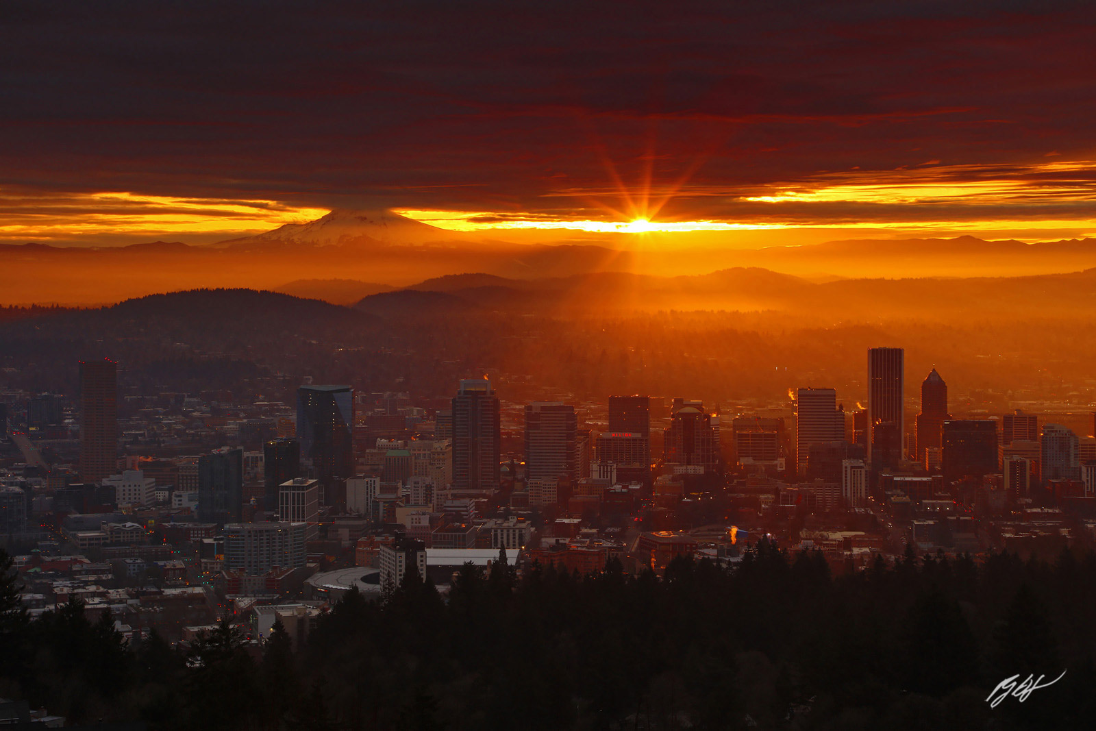 Sunrise and Sunstar over Portland and Mt Hood from the Pittock Mansion in Portland Oregon