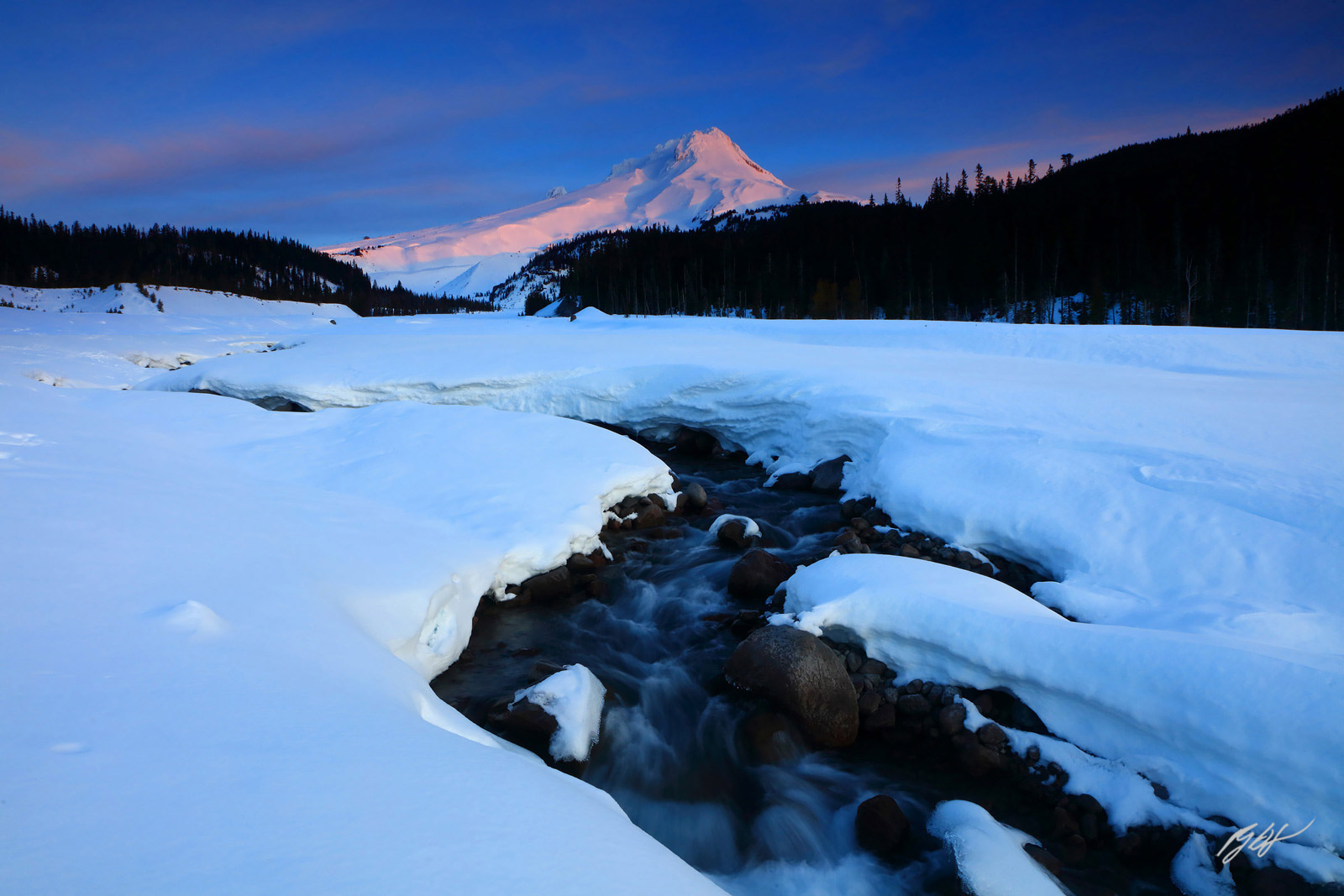Sunrise Light on Mt Hood with the White River in the Mt Hood Wilderness in Oregon